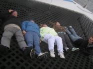 Lying on trampoline